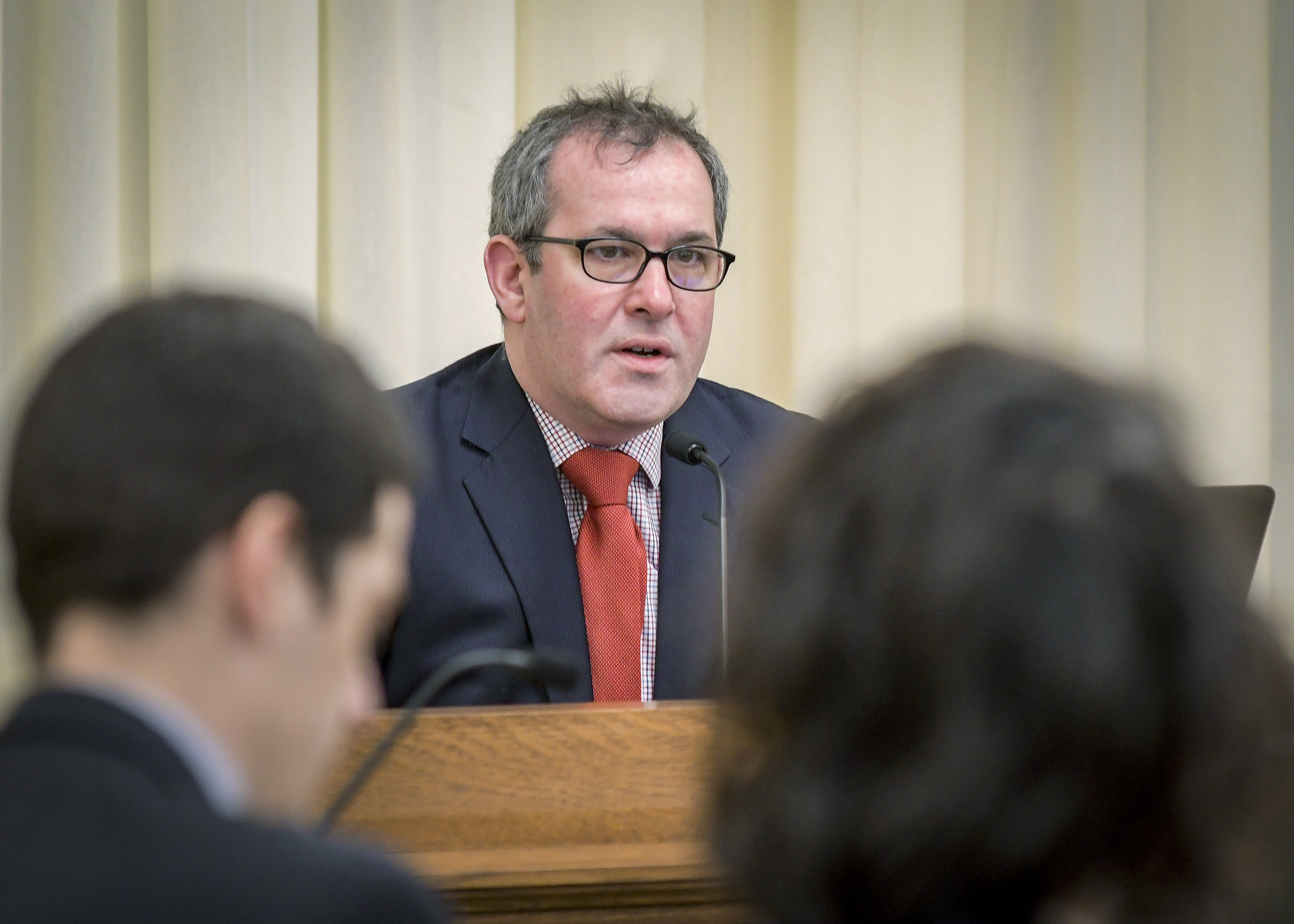 Aaron Sojourner, associate professor and labor economist at the University of Minnesota’s Carlson School of Management, presents “The First 1,000 Days Matter” Jan. 24 to the House Early Childhood Finance and Policy Division. Photo by Andrew VonBank 